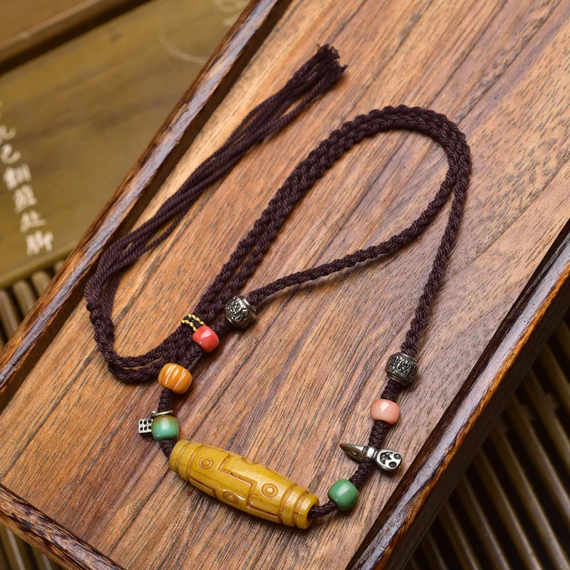 Tibetan style literature playback bone carving nine eyes dzi pendant jumper chain retro ethnic style hand-woven rope necklace
