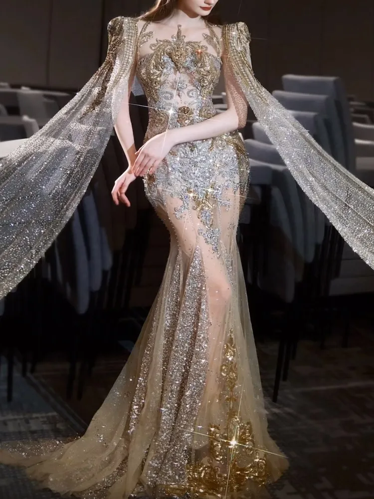 The light gold host's beaded toasting party will show off shawl dress