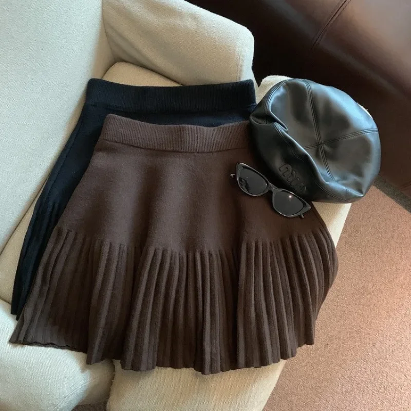 ربيع الخريف محبوك المشمش تنورة قصيرة ألف خط نصف طول المرأة المألوف مطوي تنورة صغيرة تصميم بسيط لباس غير رسمي