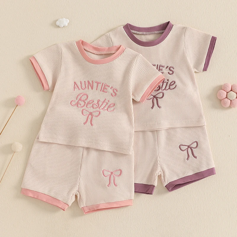 

2025-02-07 Lioraitiin Toddler Girls Waffle Shorts Set Short Sleeve Bow Letter Pattern Tops Elastic Waistband Pockets Shorts
