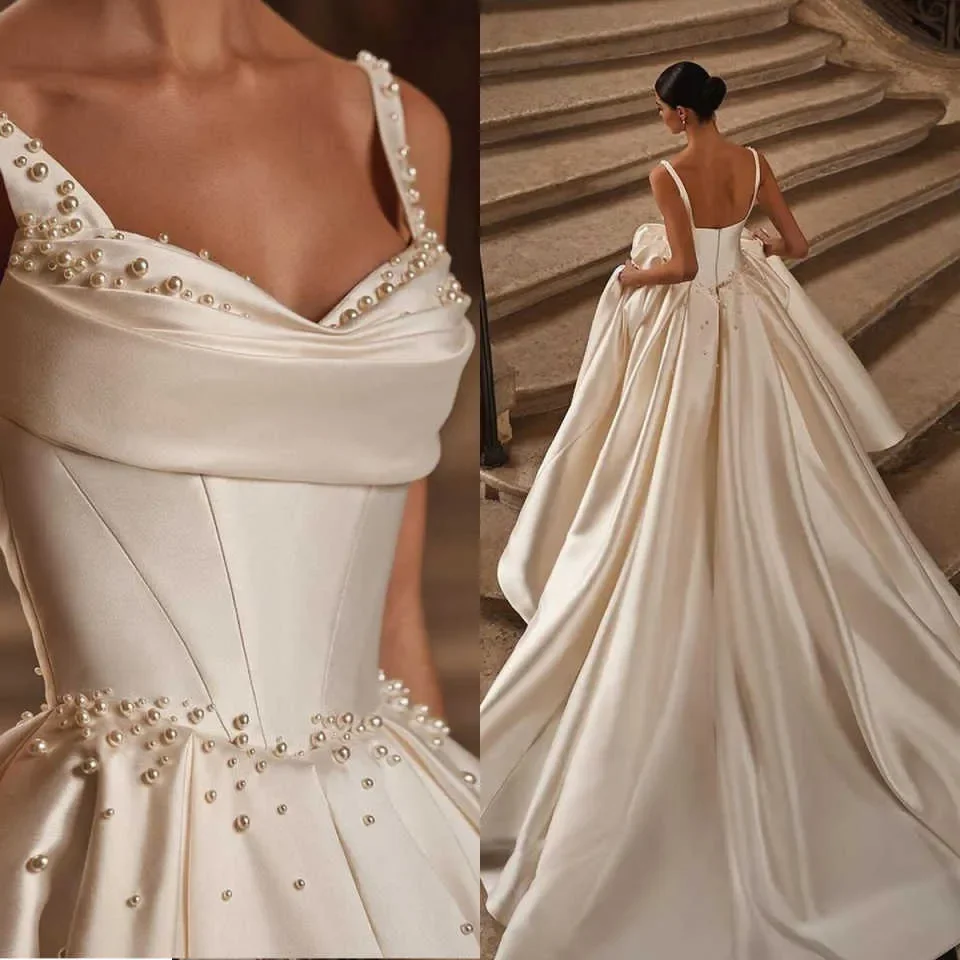 

Elegant Pearls Wedding Dresses Spaghetti Straps Bride Gowns A Line Satin Sleeveless Backless Bridal Customized