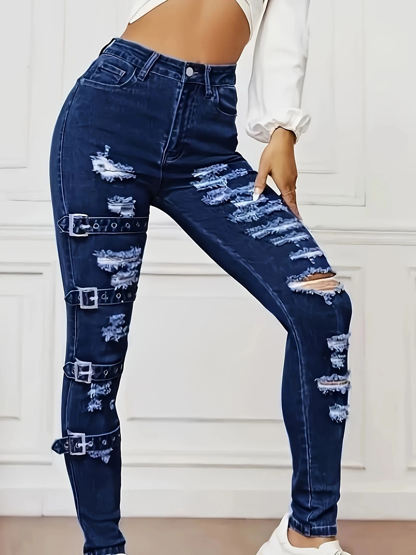 

Women's irregular fringed ripped tight jeans with adjustable hollow leg rings, stylish appearance and comfortable material