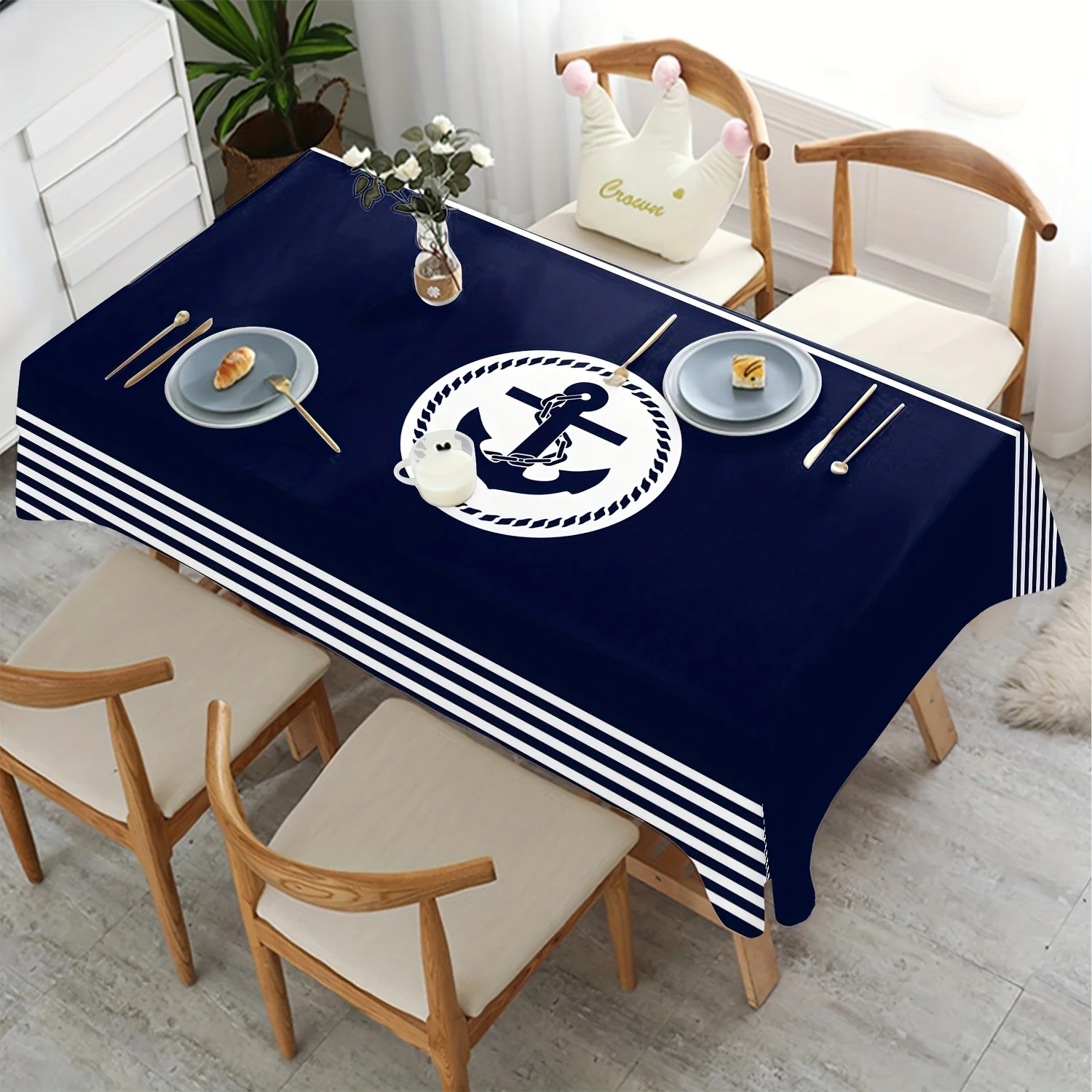 One navy blue anchor polyester tablecloth with a nautical theme