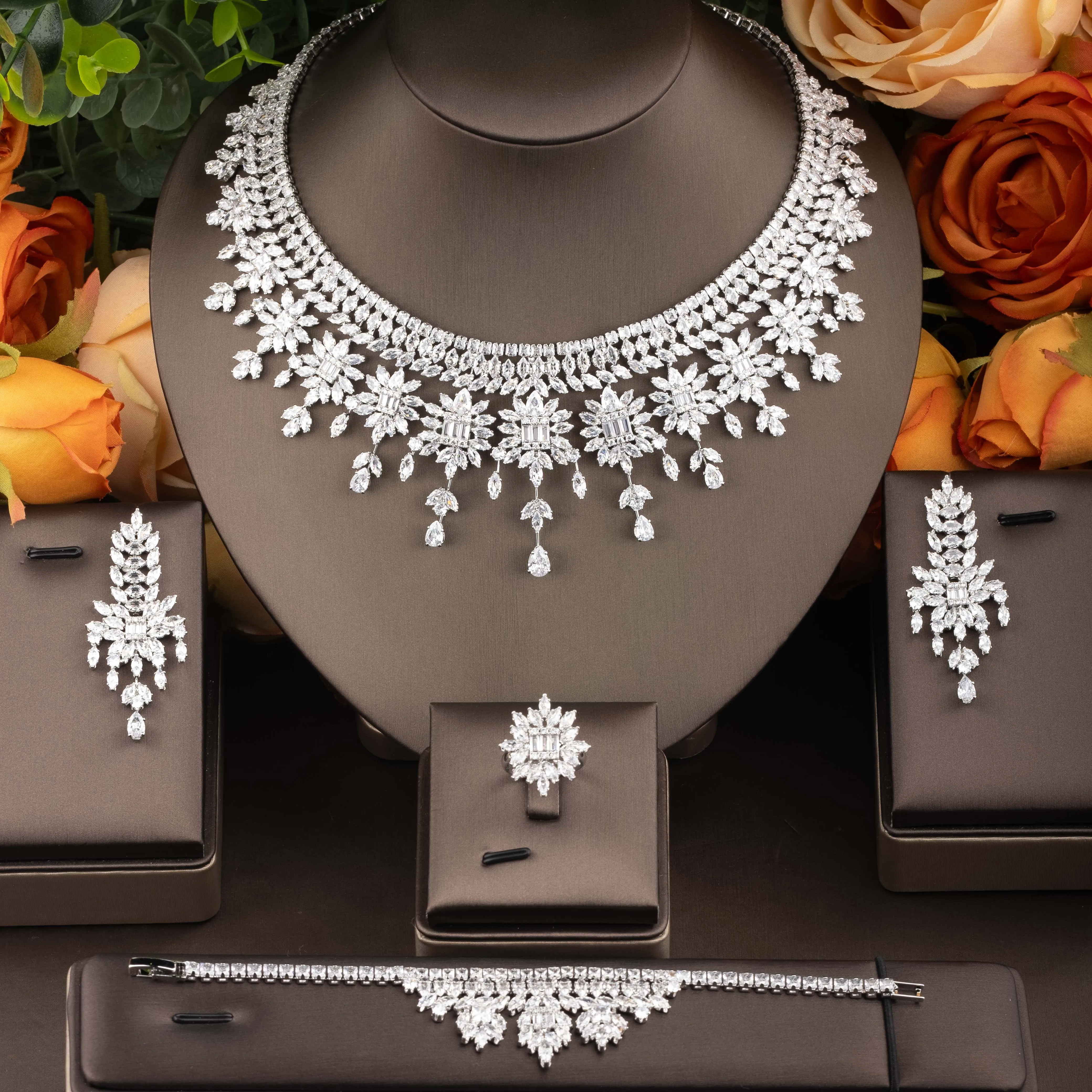 1 Set of Luxurious and Elegant Cubic Zirconia Flower Cluster Jewelry Set Suitable for Women's Daily Wear and Parties. Includes a Pair of Earrings, a Necklace, a Bracelet, and a Ring. Gift Box Not Included