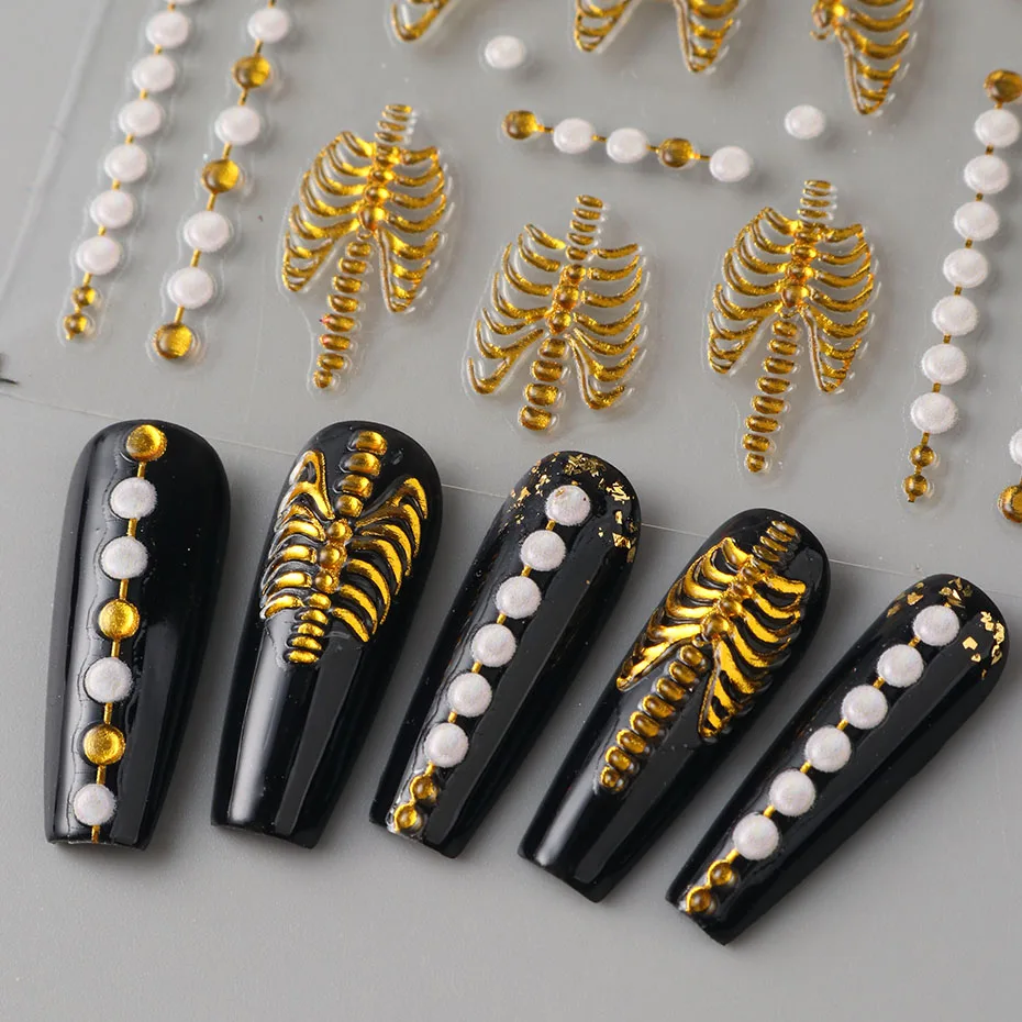 Cage à ruban de crâne d'halloween 5D, décoration de manucure auto-adhésive en relief sur le thème d'halloween avec décalcomanie d'ongle d'os de main Vintage Rose dorée