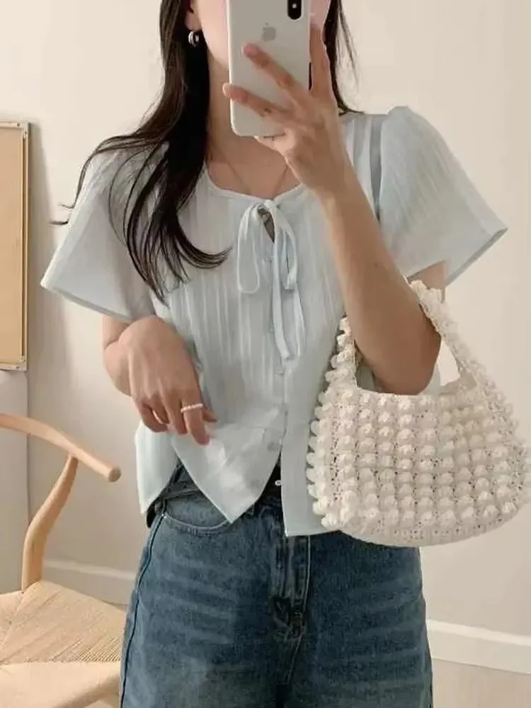 Koreański styl MD, słodki, prosty, wyszczuplający, okrągły dekolt, luźny krój, odprowadzający wilgoć, modny top damski do pracy.