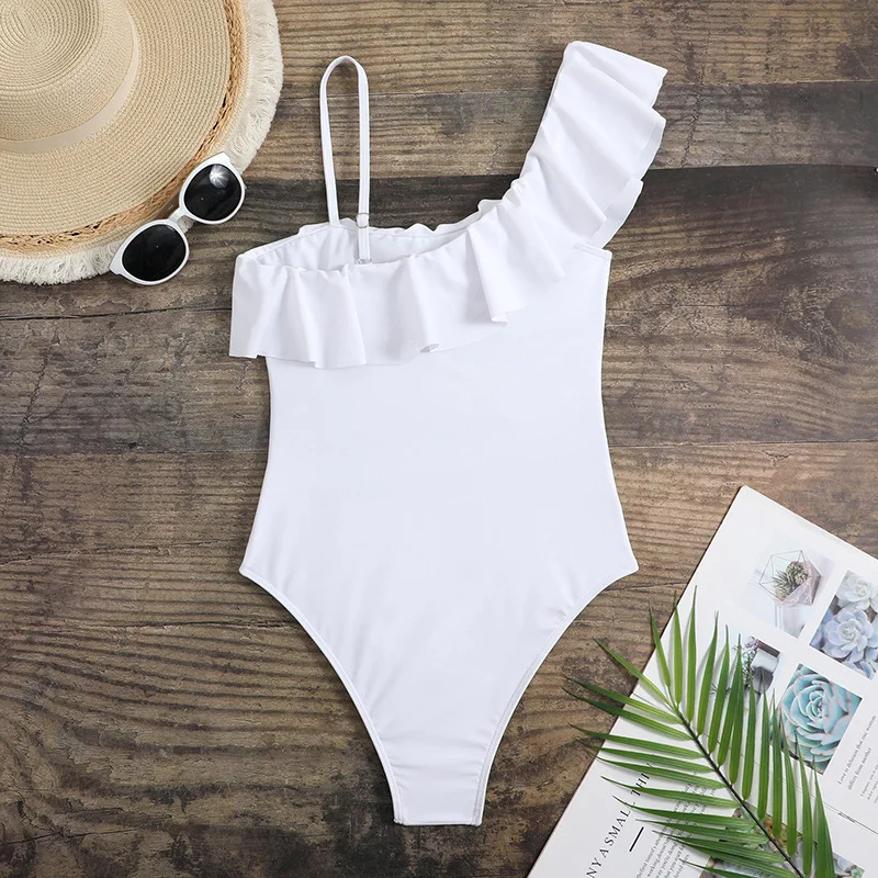 Traje de baño Sexy de Color sólido para mujer, traje de baño de retazos de malla de una pieza, ropa de playa de un hombro con volantes a la moda