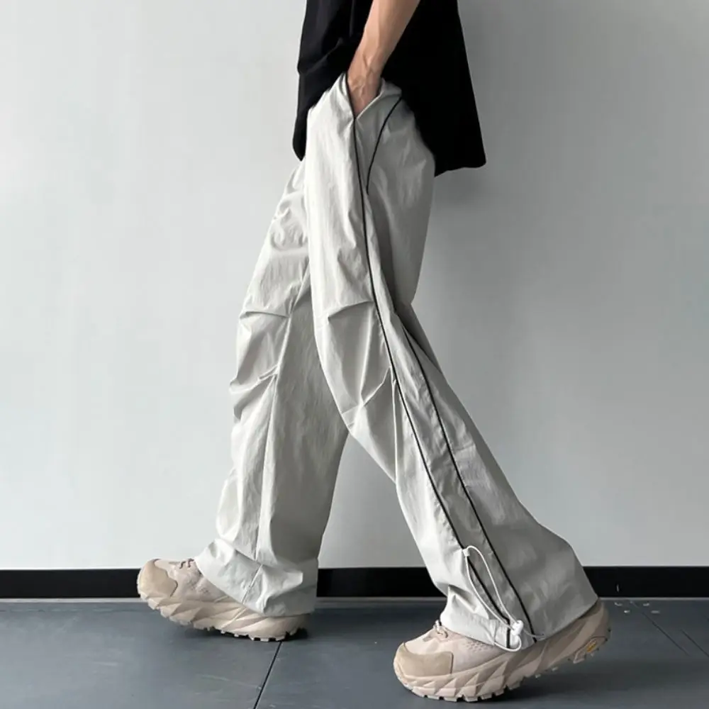 กางเกงวอร์มขายาวทรงหลวมแบบมีเชือกผูกเอว สไตล์คาร์โก้ เอวสูง ลายทาง ทรง Y2K สำหรับผู้ชาย เหมาะสำหรับเต้น