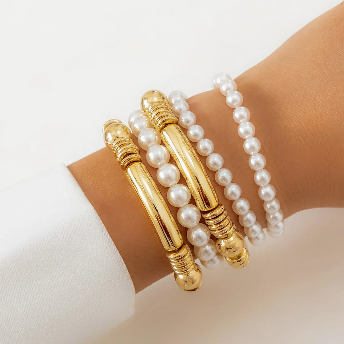 Cross-border simple ins bow pearl beaded bracelet set, fashionable stacked metal elbow jewelry women