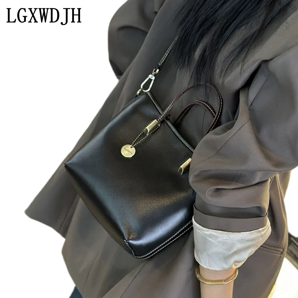 

Plant first-layer cowhide retro women's Shoulder bag European and American kitten crossbody bags for women Bucket type handbags