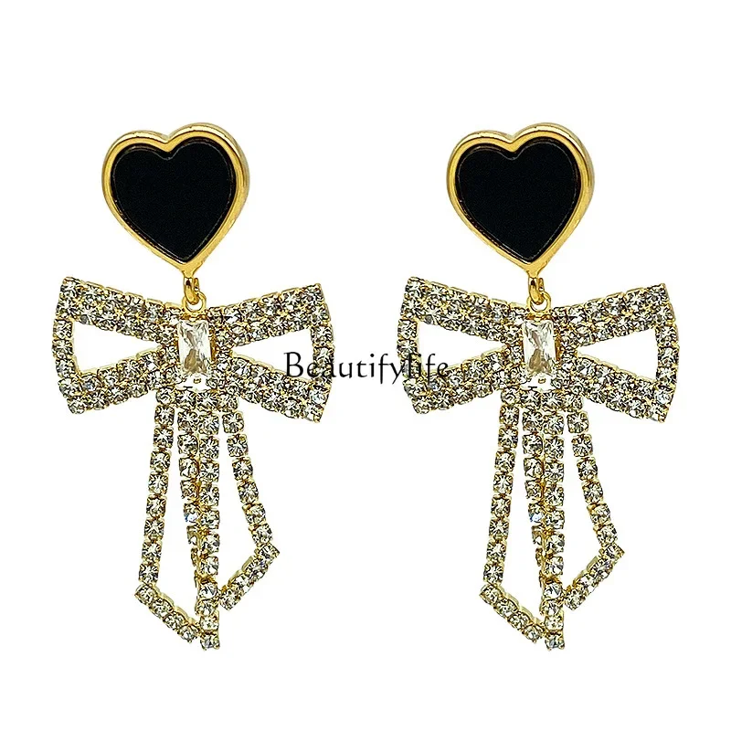 

Niche design sense of love bow earrings temperament simple diamond earrings