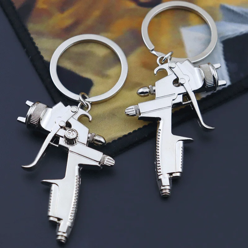 Creative Metal Simple Water Gun Keychains Men Women Fashion Pendant Keyring Jewelry Car Gun Model Key Accessories Gifts 2024 New