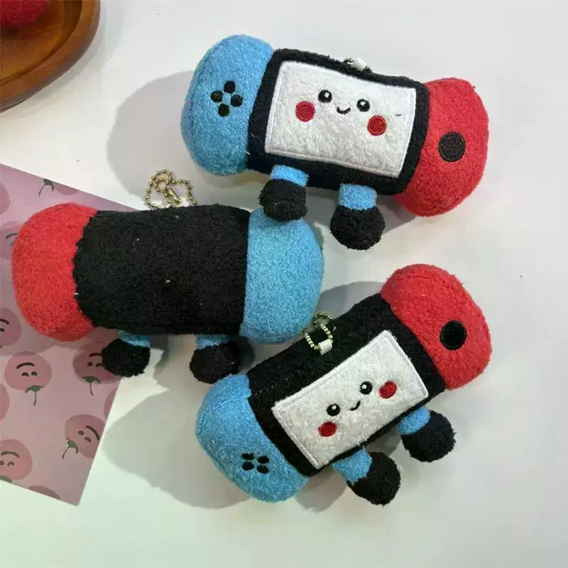 1 szt. Uroczy, zabawny pluszowy breloczek w kształcie konsoli do gier, miękka wypchana zawieszka do plecaka, ozdoba do torby, ozdoba dla par, zabawka do gryzienia dla zwierząt, prezent.