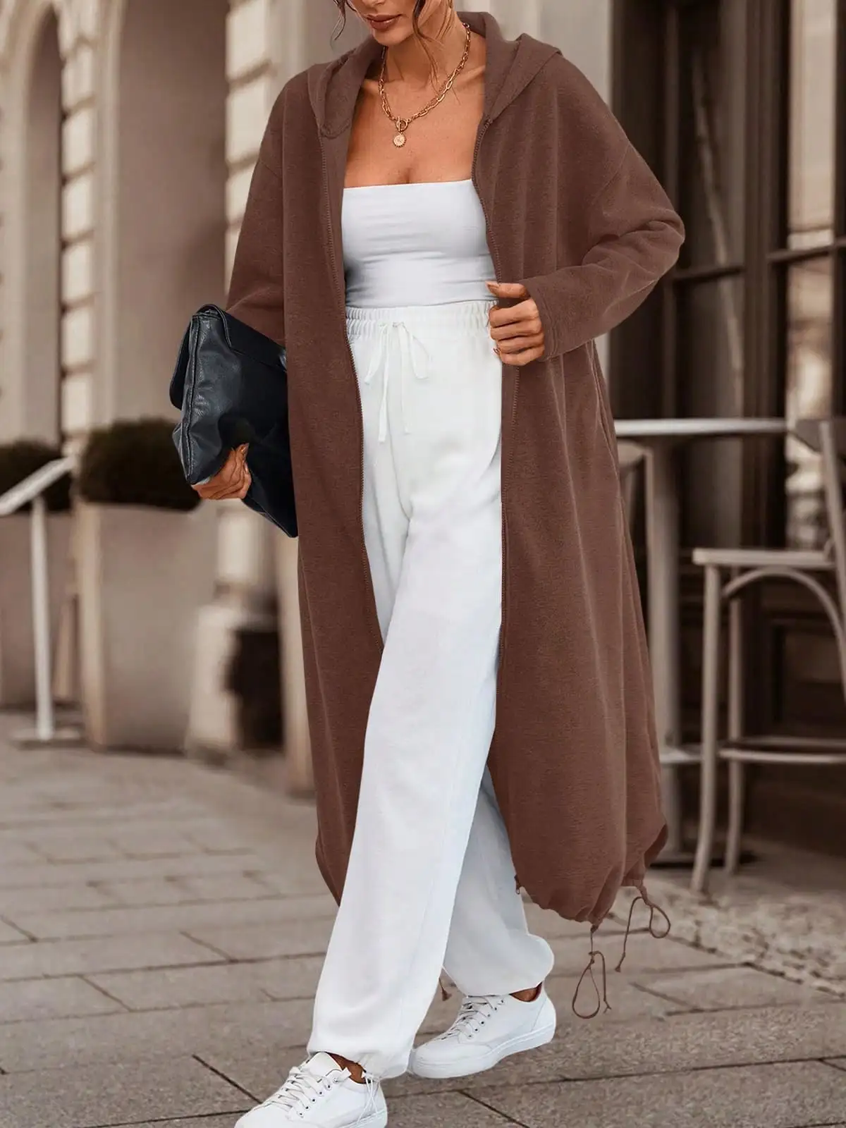 

Женская флисовая куртка оверсайз на молнии с капюшоном, карманами и длинными рукавами на шнурке для повседневной носки зимой