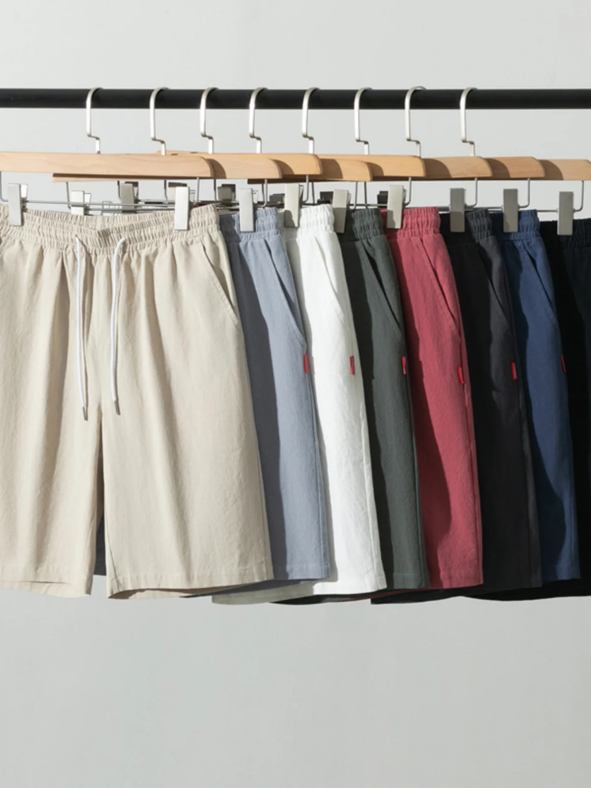 

Новая летняя мужская облегающая пляжная одежда из чистого хлопка, повседневная прямая рабочая одежда, длина футболки, эластичная футболка пять четвертей...