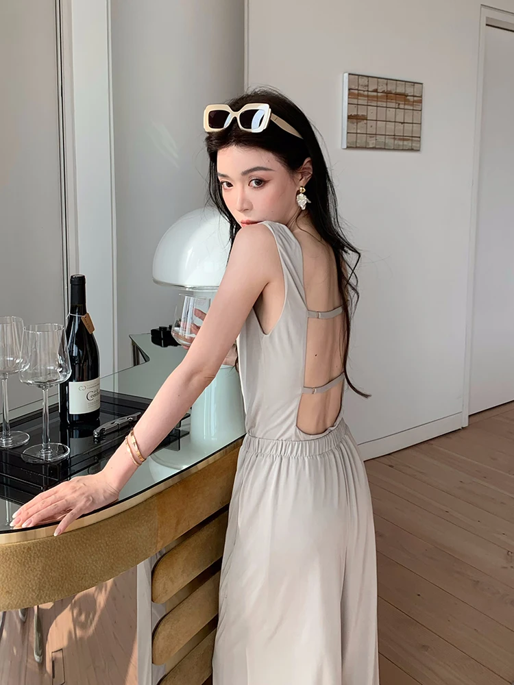 

Летний повседневный комплект из двух предметов: свободный жилет и широкие брюки в стиле кэжуал, модный летний наряд