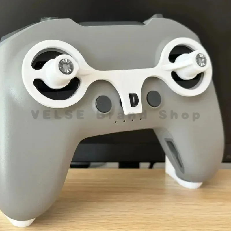 Reserved hidden buffer slot for DJI FPV Remote‑Controller organise charging wires while the handheld shell wraps the controller