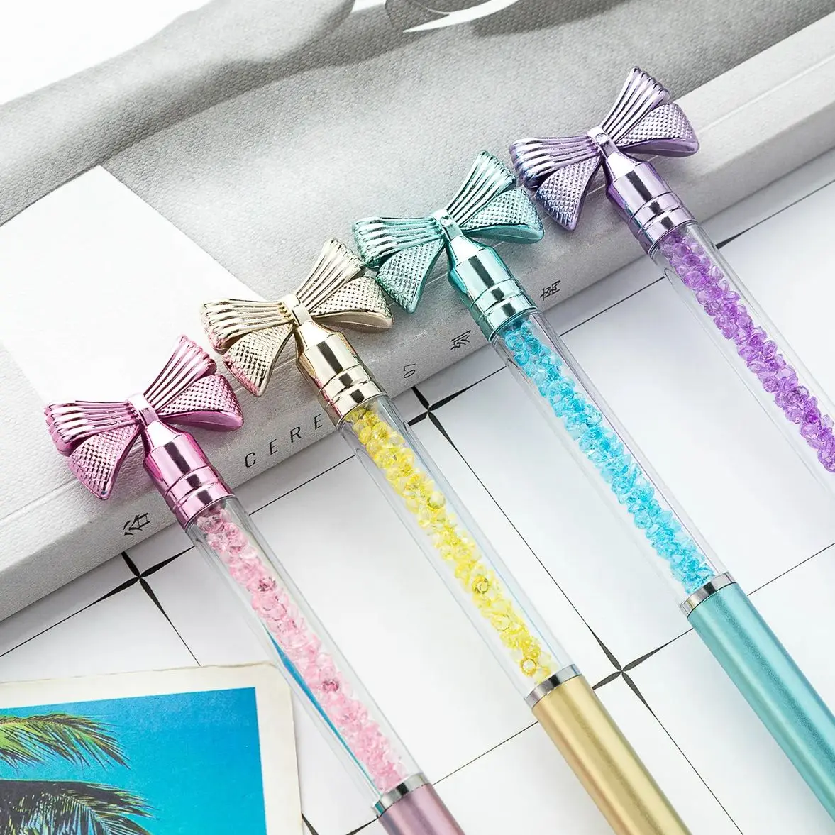 

10Pcs/Lot Creative Rotate Cute Bow Ballpoint Pens Blue Ink Crystal Butterfly Spinning Ball Pen School Office Writing Supplies