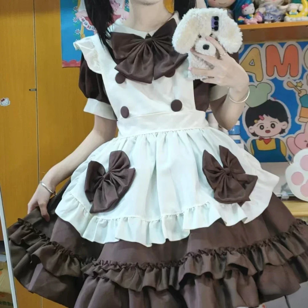 Sukienka pokojówka kobieta urocza Lolita kawiarnia pokojówka stroje Cosplay mundury japońska Maiddress brązowa kokardka z krótkim rękawem warstwowa sukienka