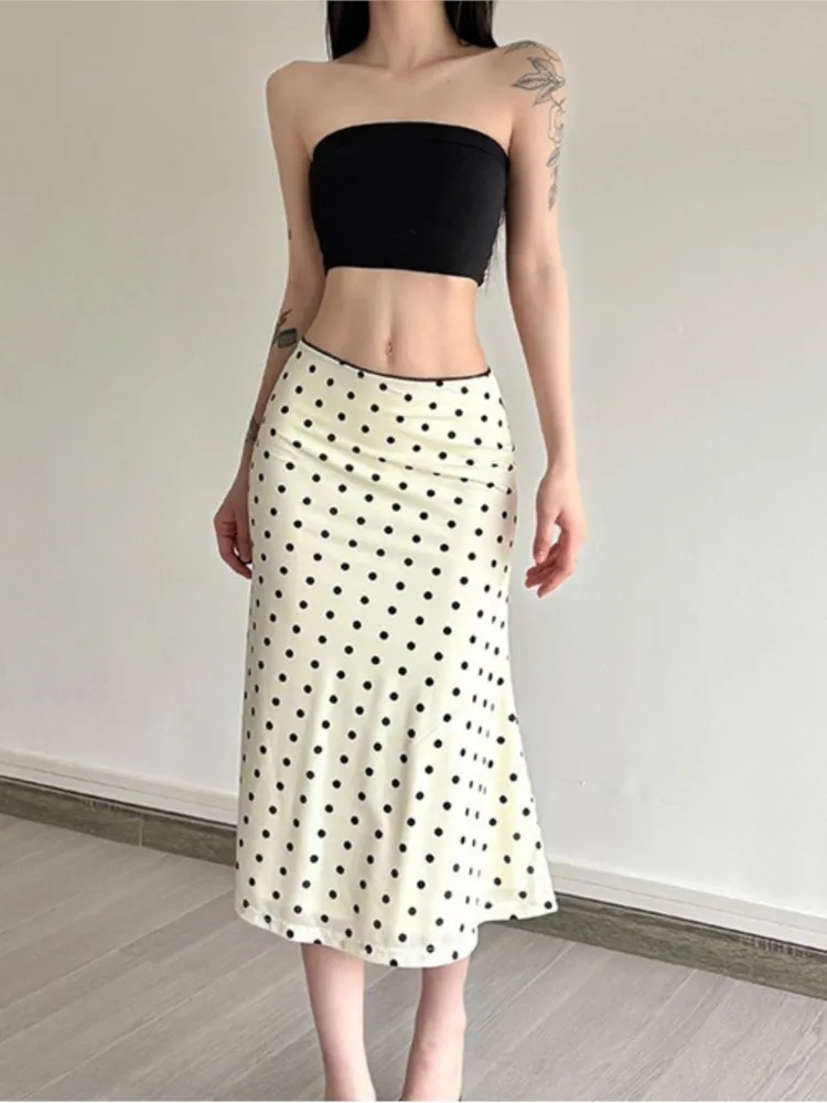 

Женская одежда Элегантная юбка в горошек Тонкая элегантная контрастная цветная отпускная простая стильная универсальная посылка Модная повседневная одежда на бедрах