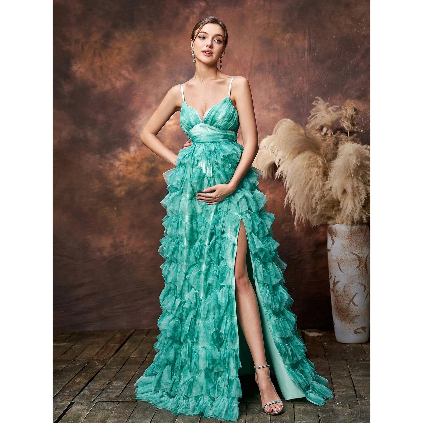 Maternity evening dresses with spaghetti straps, high slit, ruffled tulle skirt. Suitable for weddings and maternity photoshoots