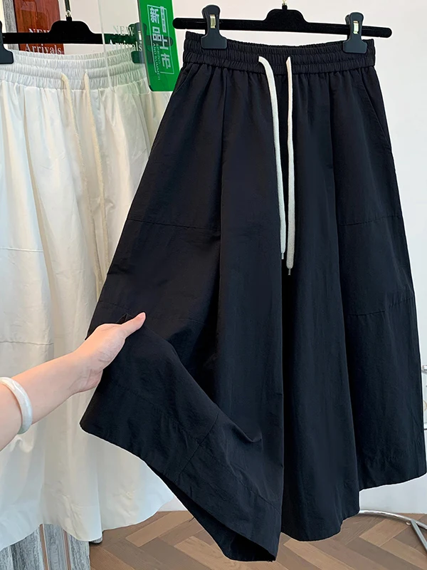 ゆったりとしたワイドレッグパンツ、怠惰なスタイル、ルーズカフ、薄い夏のカジュアルな七分丈スカート、女性用プラスサイズのズボン、快適なフィット感