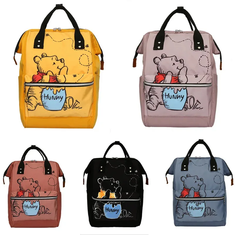 DY2025Disney nuevo bolso de mamá con estampado de dibujos animados a la moda, bolso de mamá de gran capacidad, bolso para madre y bebé, mochila impermeable para pañales y botellas