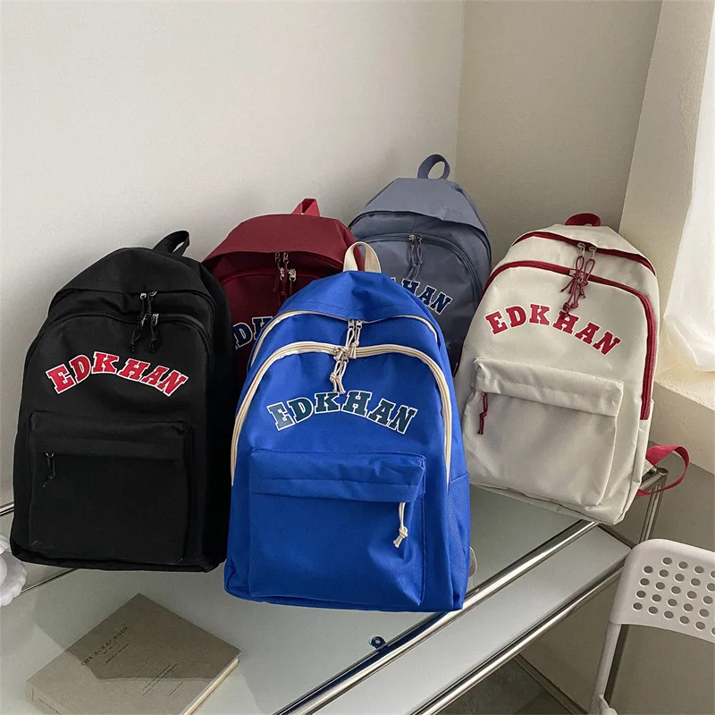 

New Simple Korean Canvas Backpack Schoolbag Female Letter Printing Large Capacity Portable Travel Backpack