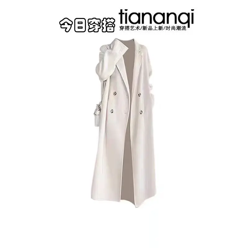 Abito in stile coreano autunno e inverno con temperamento femminile maglione lavorato a maglia a righe giacca lunga pantaloni casual set da tre pezzi