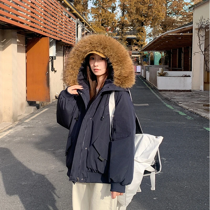Inverno grande collo di pelliccia con cappuccio giacche utensili 2025 moda donna piumino imbottito in cotone cappotto manica lunga cappotti coreani tendenza