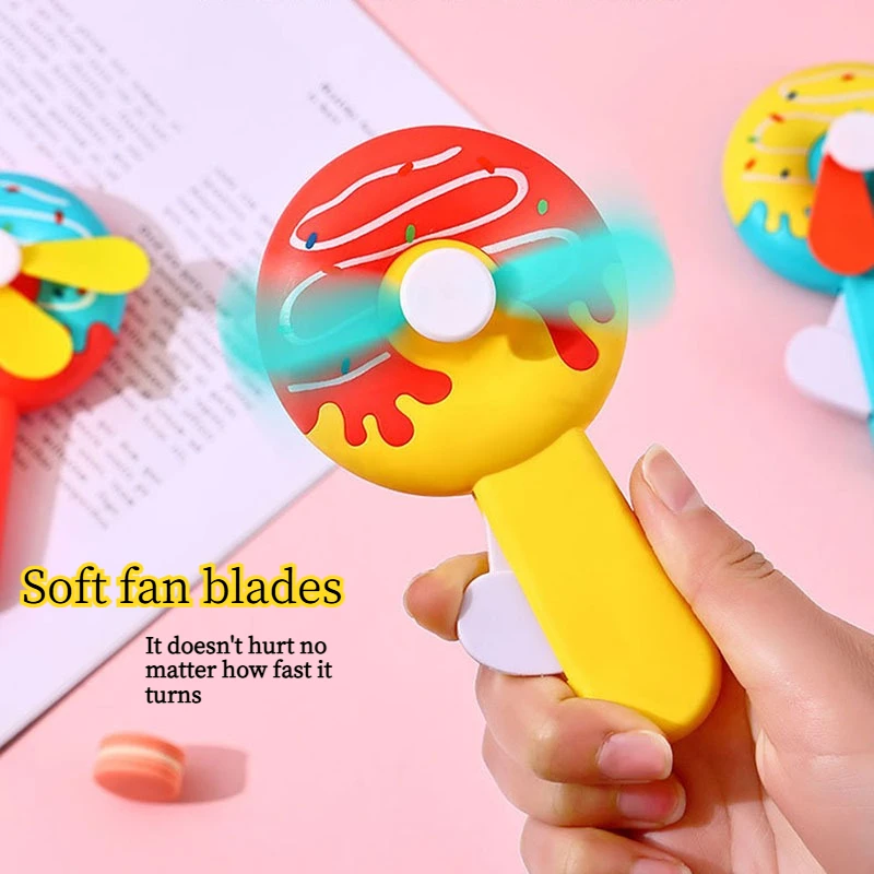1pc Cute Donut Hand Press Fan Non Electric Mini Handheld Manual Crank Cooling Fan Toy for Kids Outdoor Party Favors Summer