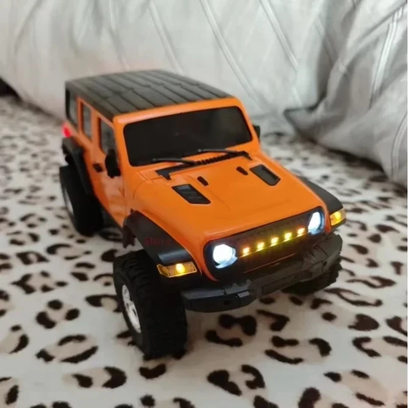 Nieuwe schaal 1:18 hydraulische schokabsorberende off-road RC auto vierwielaandrijving verstelbare snelheid klimvoertuig simulatie ontwerp