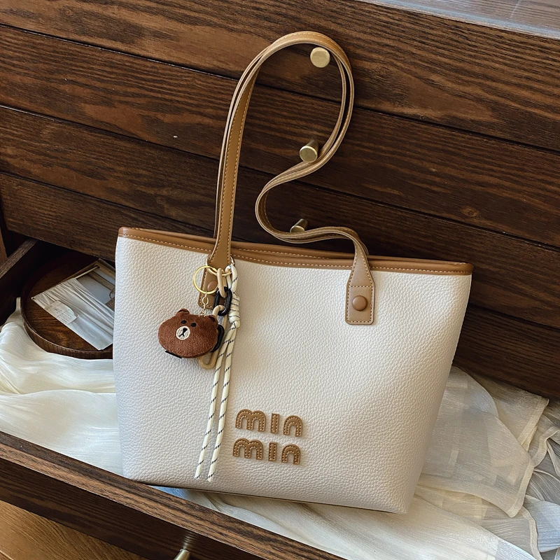 

Casual Simple Messenger Purse Bag For Leisure Business Women With Solid Color Trendy Logo And Vintage Charm