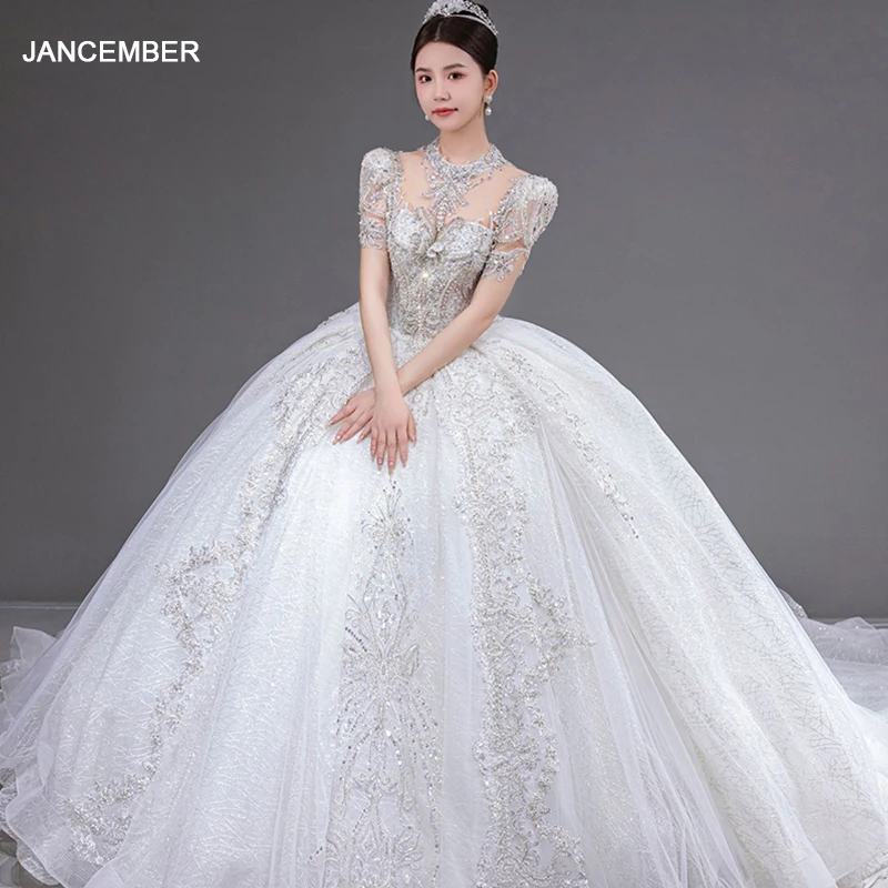 

Jancember Sequins Ball Gown O-Neck Short Sleeves Backless Lace Up Crystal Surprise Price Wedding Dresses For Women XS006