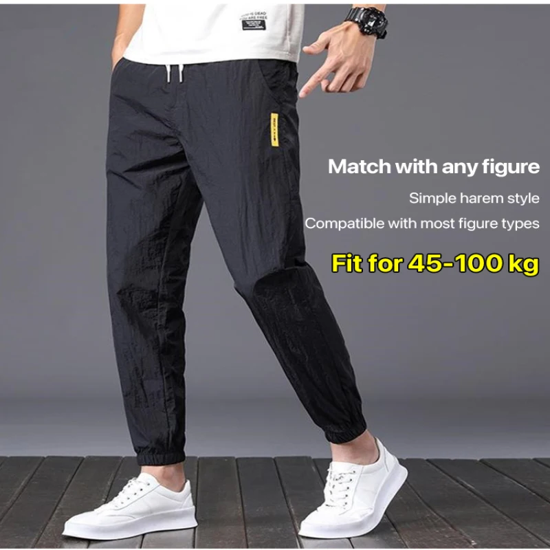 

Men's summer ice silk nineminute pants thin section loose drawstring feet ice silk casual pants