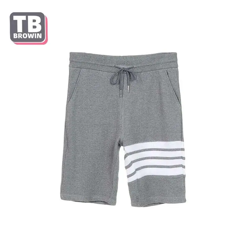 Pantaloncini da uomo TB BROWIN Luxury Brand THOM pantaloni estivi Classic Cotton 4-Bar Stripe pantaloncini grigio chiaro Sport Casual Harajuku