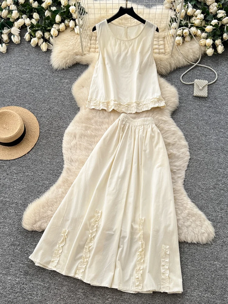 

Элегантный комплект из жилета с узлом и юбки с высокой талией для женщин: летний, стройнящий, в деловом стиле, модный ансамбль