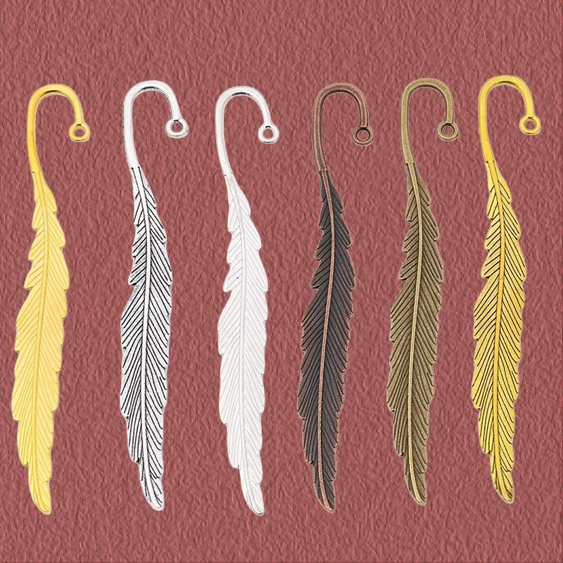 12 pièces Vintage argent alliage de Zinc breloque métal plume signet bricolage