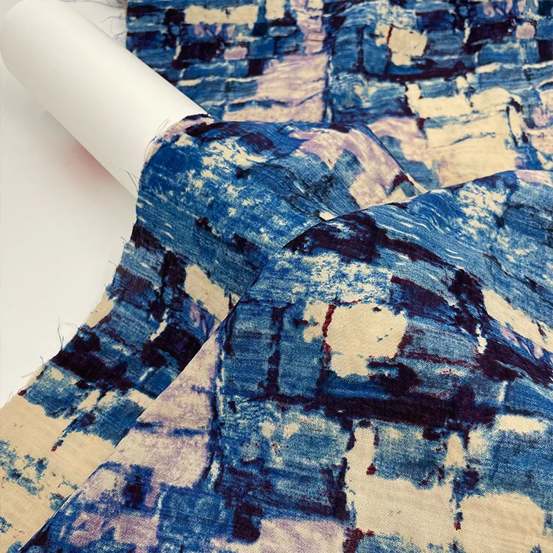 Vintage opaque distressed blue-toned cotton-linen graffiti-style tie-dye fabric for spring and summer pants and shirtsA