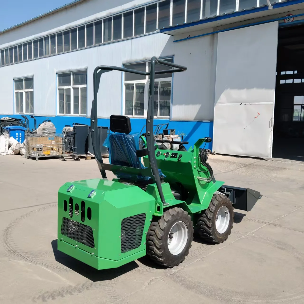 

Heavy duty wheeled 390 skid steer loader equipped with steel frame all terrain traction system