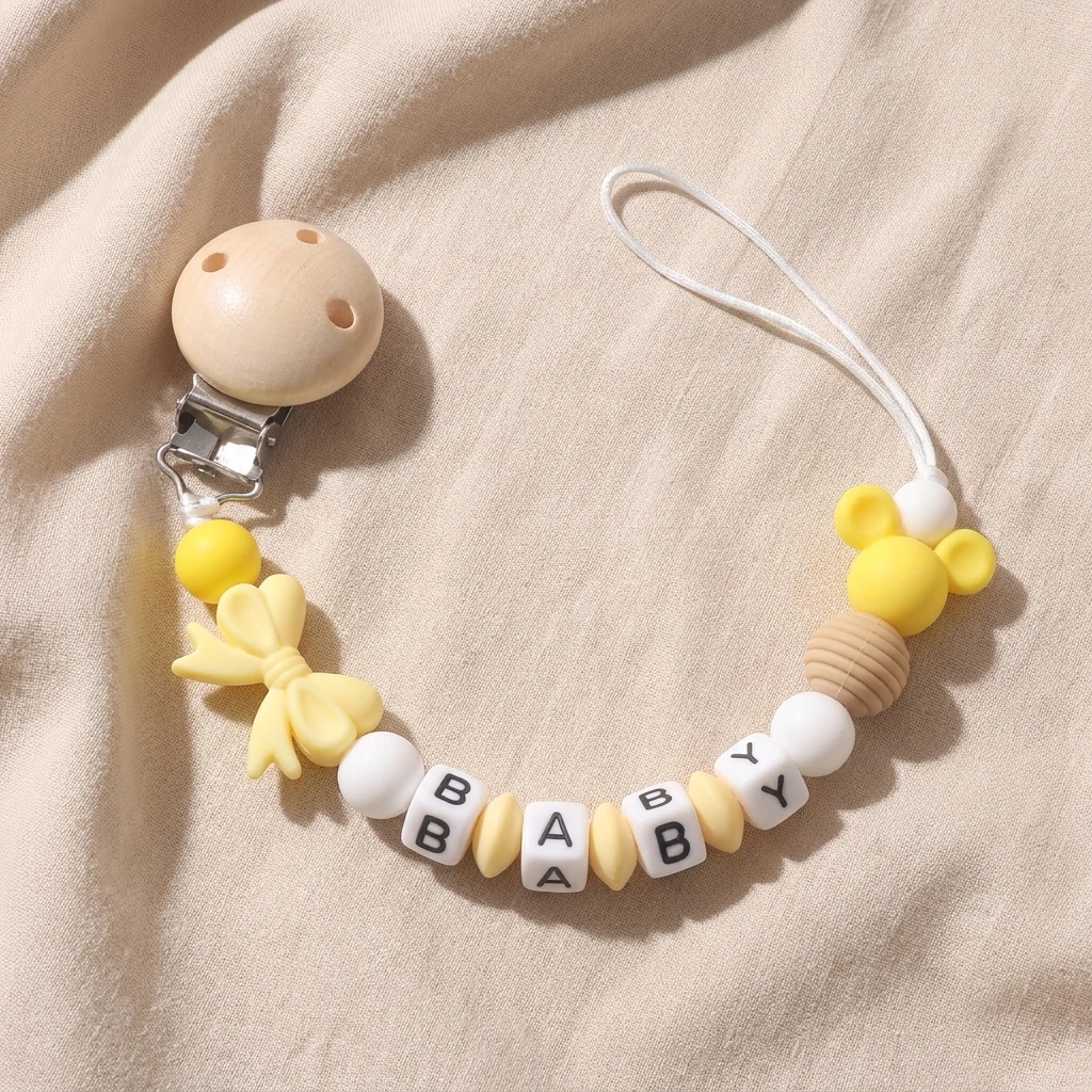 シリコン製ベビー歯固めホルダー、カスタム名入り、黄色いリボン - Baby Food Yellow のレビューと価格