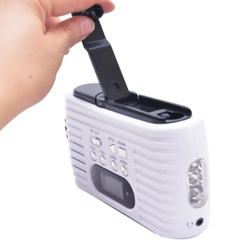 المحمولة AM راديو FM مصباح ليد USB شاحن الهاتف الطاقة الشمسية اليد هزة بطارية ليثيوم تعمل بالطاقة بنك الطاقة في الهواء الطلق مع مكبر الصوت