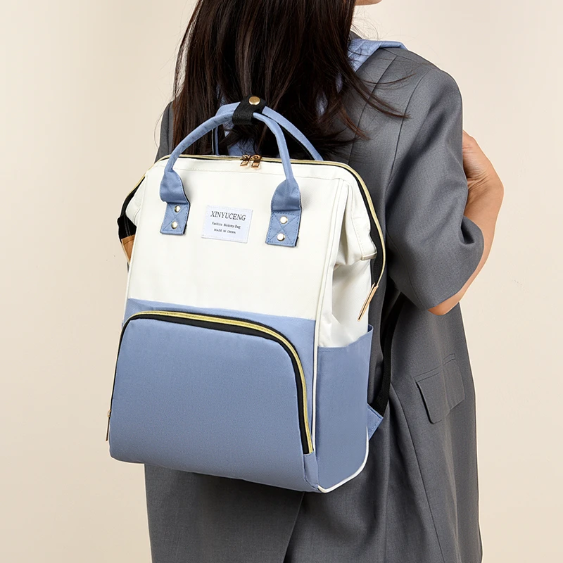 Mommy bag 2024 new color contrast backpack mother and baby mother go out fashion multi-functional backpack