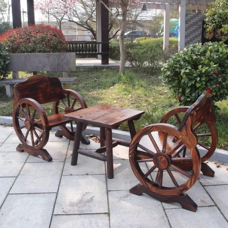 

-Three-piece set of solid wood wheel tables and chairs Single leisure wooden chair anticorrosive wooden balcony