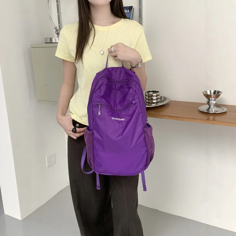 

Going out fashionable lightweight 15L outdoor mountaineering backpack men and women the same travel backpack
