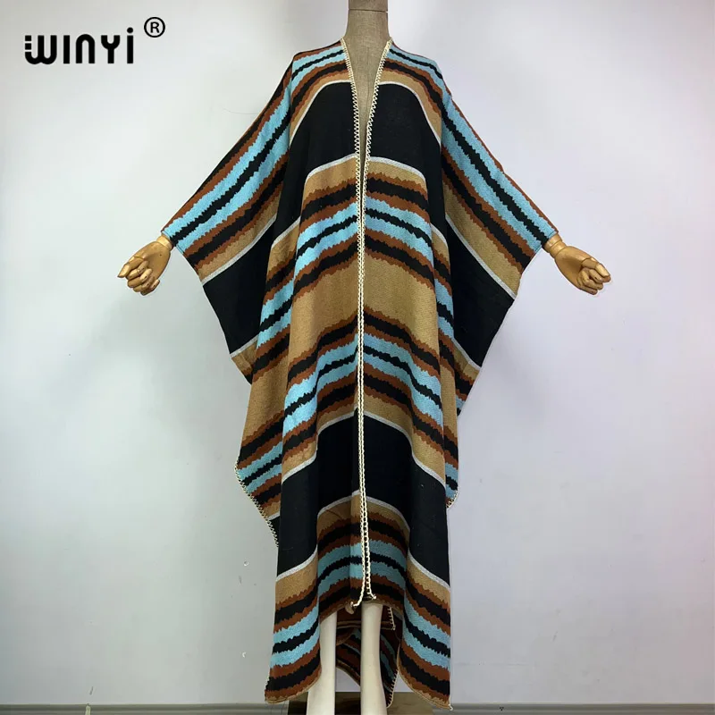 

WINYI Winter stripe cloak Women High Quality poncho tassels Luxury Long Loose OverCoat Thick Warm Female long down coat jacket