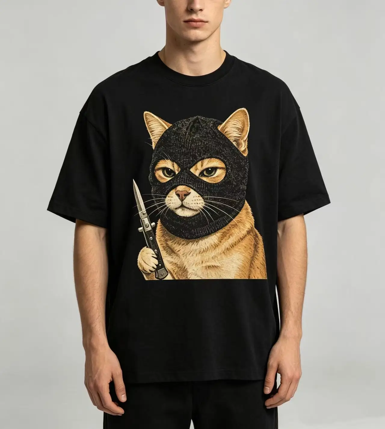 Unisex Funny Bandit Mask Cat Holding Knife Retro Graphic T‑Shirt For Men Women Cool Animal Print Tee Casual Cotton Oversized Short Sleeve Streetwear Tops