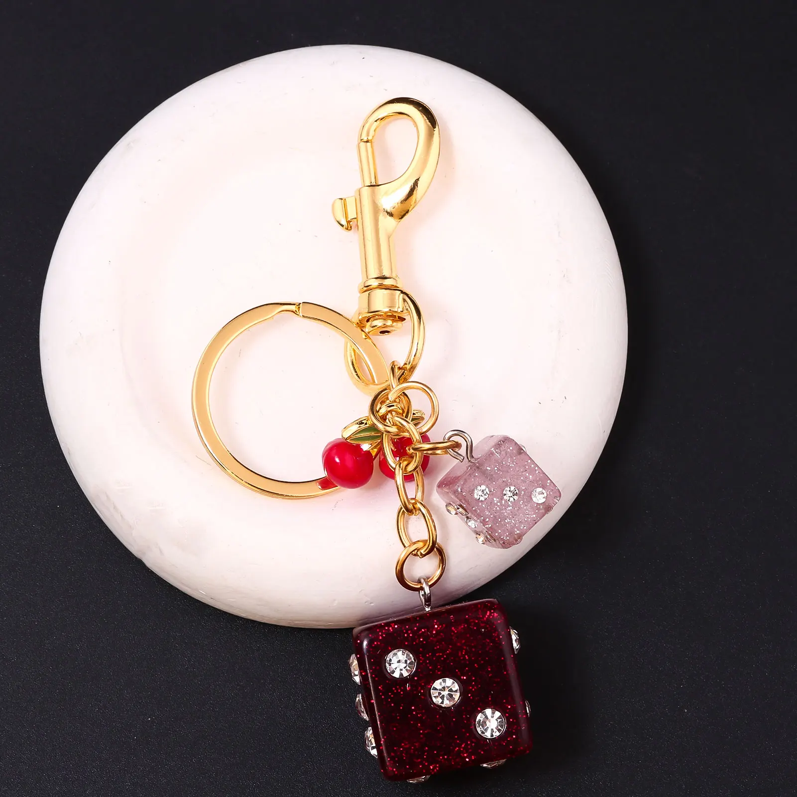 2025 Dados de lujo Cereza Bolsa Encantos Mujeres Lindas cerezas Fruta Colgante Rosa Dados Llaveros Niñas Bolsa Accesorios блок для клю opet©