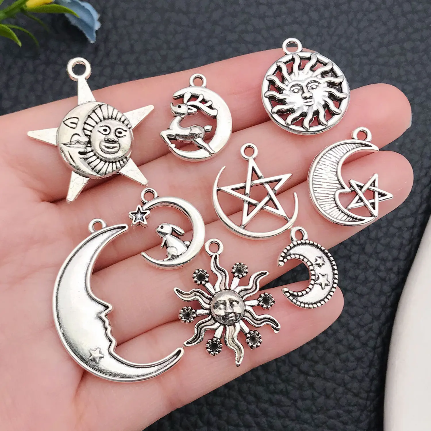 New Arrival: Assortment of 21 Star, Moon, and Five-Point Star Pendants - Vintage Alloy Charms for DIY Jewelry.