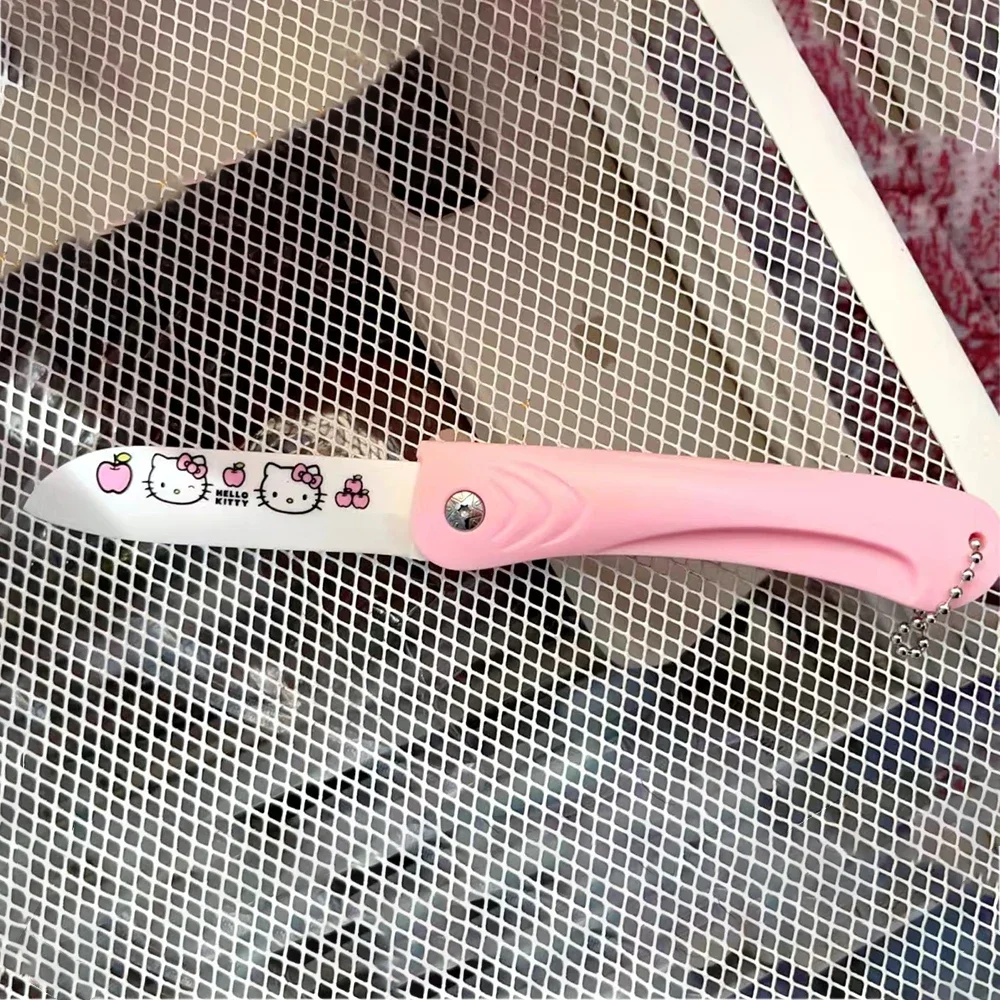 Cuchillo plegable de cerámica Sanrio de HelloKitty para el hogar, 4 piezas, Kawaii, dibujos animados, viaje exquisito, pelador de comida, regalo